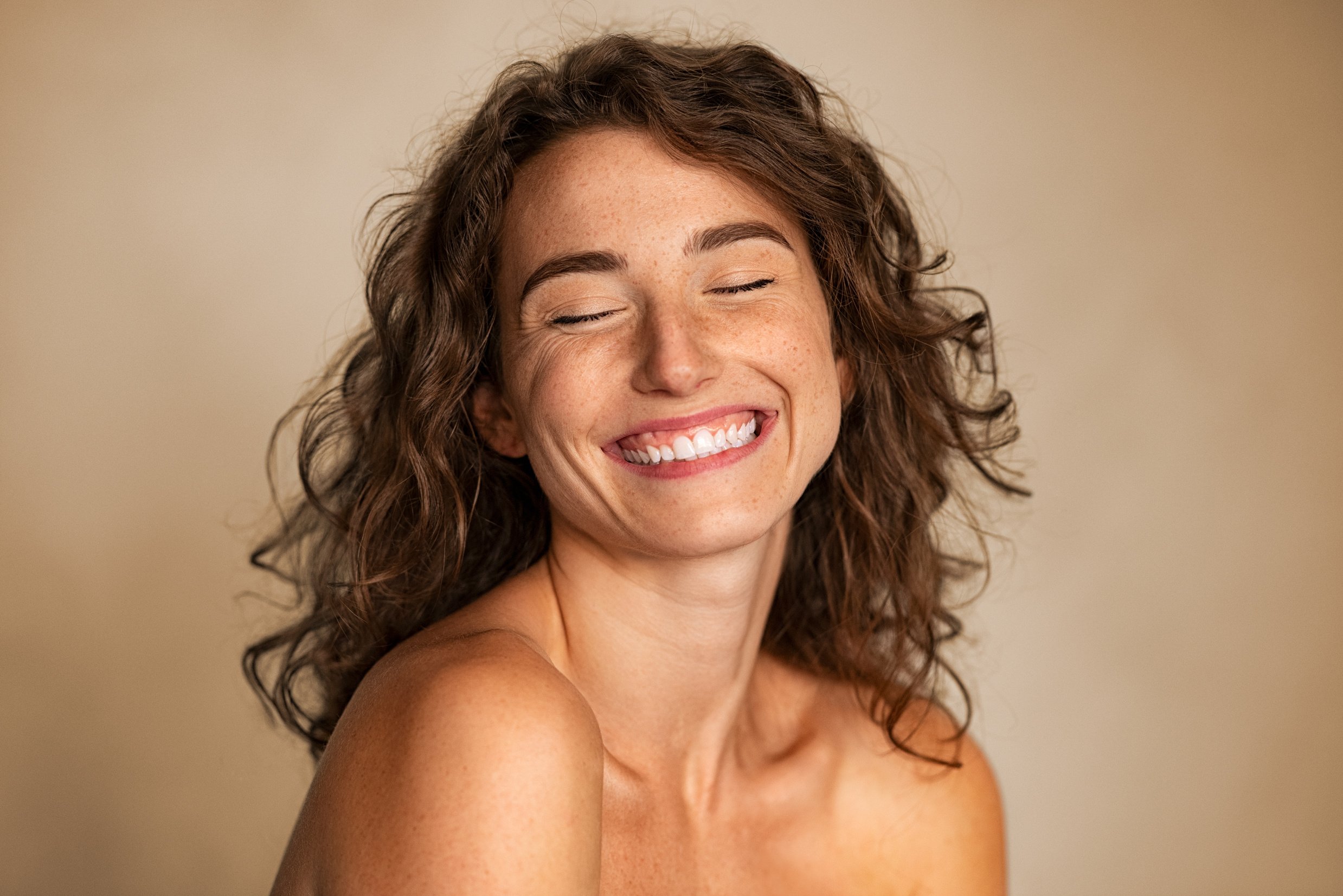 Beautiful Woman Laughing with Joy